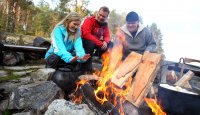 Outdoor meal by the fire