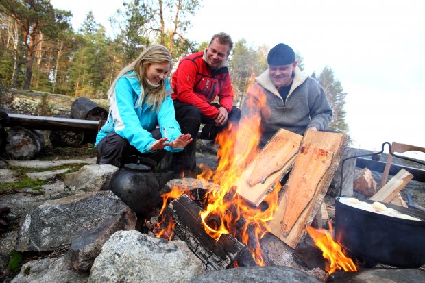 Outdoor meal by the fire