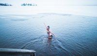 Dipping in a frozen lake from the sauna - Laura Vanzo
