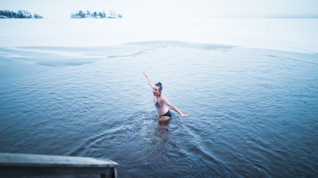 Dipping in a frozen lake from the sauna - Laura Vanzo